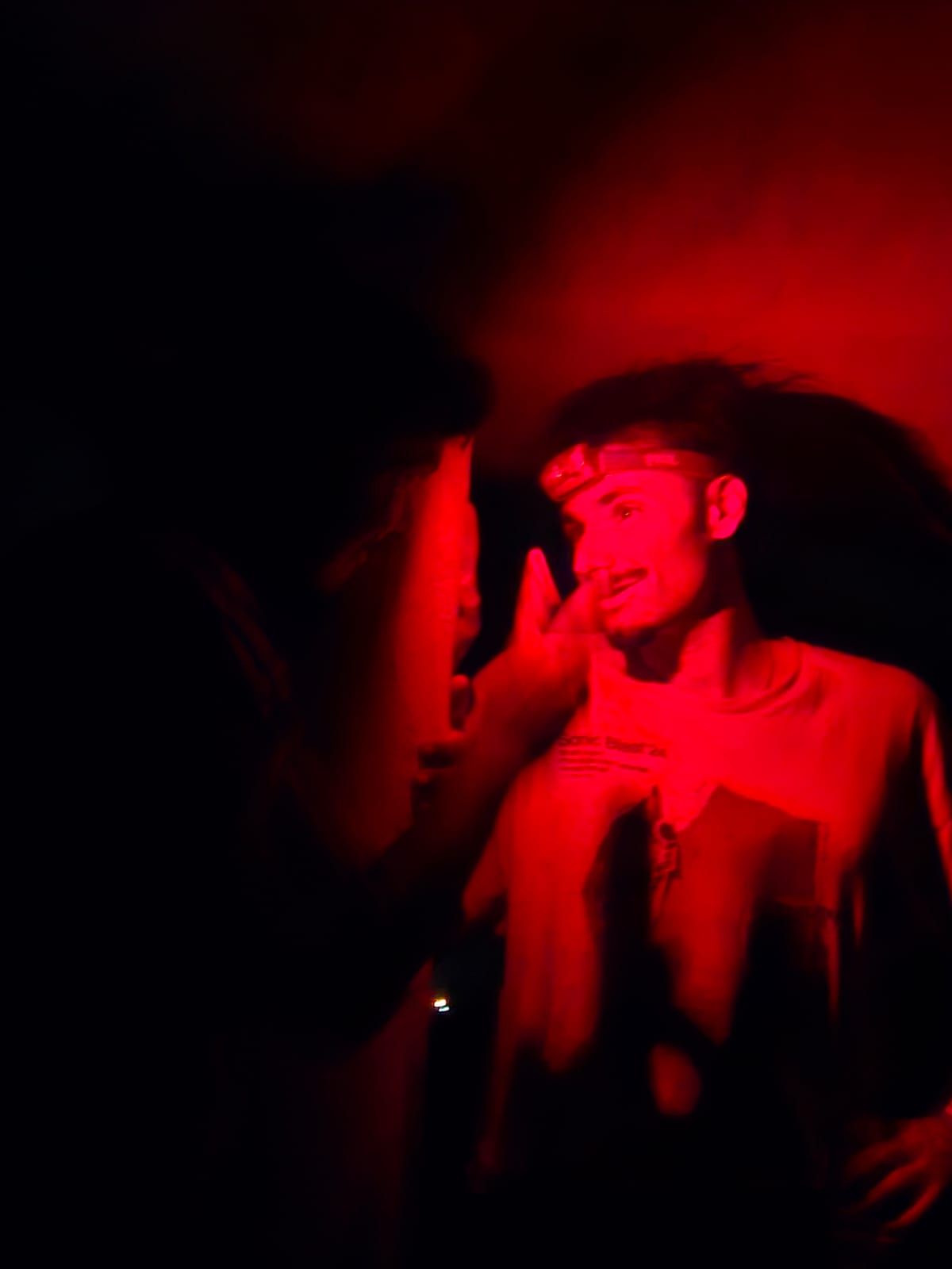 Main in red light under shed